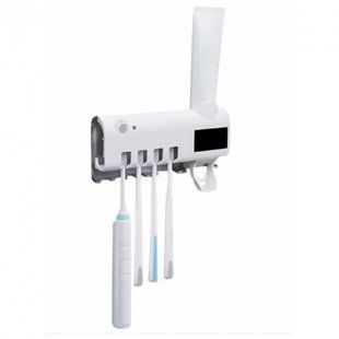 Диспенсер для зубной пасты и щеток автоматический с УФ-стерилизатором Toothbrush sterilizer 43001 фото